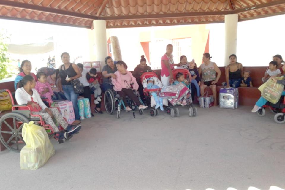 PART DE LOS ASISTENES web Tercera entrega de cenas y paquetes de pañales “Solo por la Gracia de Dios”